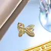 [Oro Real de Cobre] Lujo Ligero Rama Dorada Hoja de Circonio Exportación Transfronteriza DIY Joyería Hecha a Mano Accesorios de Colgante Incrustados con Micro Circonio de Cobre
