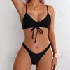 Comercio exterior nuevo traje de baño europeo y americano para mujer conservador de color liso de dos piezas dividido bikini de tanga de cintura alta al por mayor