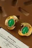 Pendientes de Ágata Ovalados Geométricos Estilo Corte Europeo y Americano para Mujer, Pendientes de Botón Versátiles de Fuegos Artificiales Giratorios Rayados Simples de Moda