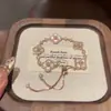 Pulsera de flor de acetato rosa con circonita, ligeramente dulce y delicada, fresca y dulce, joyería con sensación de lujo ligero y alta gama