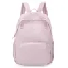 Mochila de moda de color sólido estilo japonés de nailon, mochila ligera versión coreana para estudiantes de secundaria, hombres y mujeres, estudiantes universitarios para clase y salidas