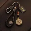 Llavero para coche Bao Shi para hombre y mujer latón 12 signos del zodíaco llavero colgante hecho a mano retro creativo mano de dinero para hombre