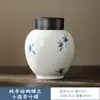 Aceite de cerdo blanco vidriado pintado a mano puro tarro de té mediano blanco té verde empaque tarro sellado phalaenopsis cerámica tarro de té para despertar