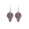 Os novos brincos longos com pingente de turquesa da Heming Jewelry são brincos de estilo étnico com um design único e apelo versátil