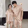 Pijama corto de manga corta para pareja de primavera y otoño al por mayor para hombre y mujer, seda helada, color liso, imitación de seda, se puede usar como ropa de casa o traje