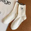 Calcetines para Mujer Calcetines de Caña Media con Borde de Oreja de Madera Otoño Lindos Dibujos Animados Hilo de Punto Combinación Perfecta Encaje Lazo Calcetines de Estudiante Tendencia