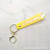 Llavero de Correa de Goma Suave de Gato Kt de Dibujos Animados Muñeca Linda Accesorios para Bolsos Decoración Lazo Llave de Coche Lindo y Divertido