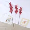 Venta al por mayor del fabricante Flor Artificial Dorada Flor de Navidad Fruta Roja Fruta de la Fortuna Flor de Nochevieja Fruta de Acebo Hoja de Ginkgo Simulada