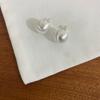 Otoño e Invierno nuevos aretes de botón de bola esmerilada cepillada hechos a mano para mujer diseño de nicho europeo y americano aretes simples de alta gama aretes aretes