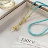 Nuevo Collar Estilo Chino Imitación Turquesa con Colgante de Campana Dorada Antigua, Cadena de Suéter Nacional Estilo Tíbet con Diamantes de Punto y Mantra de Seis Caracteres