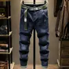 Jeans de marca de alta gama de moda para hombre, nuevos para la primavera, pantalones tipo cigarrillo de corte slim, estilo coreano, pantalones largos elásticos, modernos y versátiles