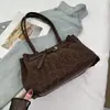 Bolso de axila para mujer nuevo, elegante y único, para trabajadoras de oficina, bolso de hombro y bolso de mano de alta gama y a la moda, Primavera 2026