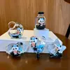 Muñeca de Dibujos Animados astronauta hombre del espacio botella de arena movediza decoración de escritorio regalo de cumpleaños creativo joyería de cristal al por mayor