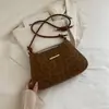 Bolsos populares de estampado de leopardo para mujer de este año 2026 nuevos bolsos de moda para el hombro para mujer bolsos de hombro versátiles retro