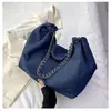 Bolso de mezclilla para mujer, gran capacidad, nuevo modelo 2026, bolso de hombro versátil con cadena para cruzar el cuerpo, bolso de tela con un toque de alta gama, bolso tote
