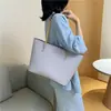 Bolso tote de cadena de moda transfronterizo para mujer, diseño de nicho, bolso de hombro de gran capacidad para el trabajo, bolso de axila vintage de alta gama