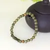 Especificaciones de la pulsera de bambú DIY de sándalo verde 0,6 para hombres y mujeres, rosario de viento simple, fabricantes de joyas decorativas al por mayor
