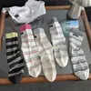 Nuevos Calcetines Clásicos de Algodón Gris Sin Costuras de Estilo Europeo para Todas las Estaciones con Lazo de Cinta para Mujer 2025