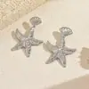 Brincos de Ouro Atacado Europeu e Americano Transfronteiriços Irregulares Brincos de Estrela do Mar para Mulheres Férias na Praia Textura Plissada Brincos Exagerados