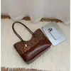 Bolso Tote para Viajes Cotidianos Bolso de Hombro de Gamuza Empalmada de Gama Alta Nicho Bolso de Mano para Mujer Nuevo Invierno 2026