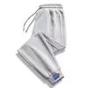 Pantalones Casuales Estilo Coreano para Niños Primavera y Otoño Nuevo Estilo Diseño Personalizado Pantalones de Chándal de Pierna Ancha para Adolescentes Pantalones Deportivos Versátiles