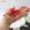 Pulsera de Cuerda Roja con Amuletos de Trébol, Mariposa y Cristales, Pulsera Tejida Ajustable para Parejas y Estudiantes, Joyería de Año de Nacimiento
