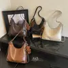 Otoño 2026 Bolso de Axila de Gran Capacidad Moda Retro Bolso Tote Simple Nicho Personalidad para Viajes Versátil Bolso Dumpling