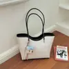 Bolsa de tela de moda ins 2026 verano nuevo bolsa de cesta de gran capacidad bolsa de hombro simple para el trabajo bolsa de axila