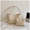 Bolso de axila tejido de lujo ligero de alta gama, bolso simple de moda para madre e hija, bolso de hombro casual de estilo coreano para el día a día