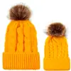 Comercio exterior europeo y americano en otoño e invierno gorro tejido de punto de bola retorcida cálido para mujer padre-hijo imitación bola de pelo de mapache gorro de lana