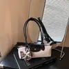 Bolso de verano tipo dumpling de estilo coreano transfronterizo nuevo de lujo ligero de nicho para mujer, moderno y versátil, bolso simple de un solo hombro cruzado para mujer, para el trabajo