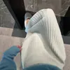 Diseño dulce y elegante, falda midi acanalada blanca, nuevo modelo de otoño 2026, efecto de caída, falda larga de cintura alta adelgazante