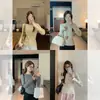 Elegante top de punto para principios de primavera estilo Chanel, nuevo jersey de primavera 2025 con cuello redondo y bordes festoneados, camiseta básica para mujer