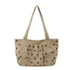 Bolso de mano de color liso con lunares, estilo coreano minimalista para mujer, nueva colección 2026, gran capacidad, ligero, bolso de hombro tipo tote, venta al por mayor para ir al trabajo