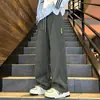 Pantalones Impermeables Color Dopamina para Exteriores Cuatro Estaciones Pantalones de Montañismo Marca de Moda para Hombre Decoración con Cremallera Pierna Recta Casual Hombre