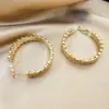 Pendientes de Aro Geométricos de Línea Irregular de Nicho Europeo y Americano con Pendientes de Diseño Elegante, Moderno, Lujo Accesible y Hebilla Elástica Personalizada