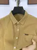 Camisa Versátil Nueva de Manga Larga Vintage para Hombre, Top de Trabajo, Chaqueta Camisa Casual de Color Sólido, Primavera y Otoño 2026