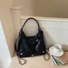 Bolsa de Gran Capacidad 2026 Nuevo Modelo Mochila Estética de Alto Valor Diseño de Nicho Estilo Relajado para Viajes Diarios Bolso de Hombro Cruzado