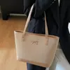 Bolsas de Alta Gama Casuales Transfronterizas para Mujer 2025 Nuevo Diseño de Bolso de Hombro Versátil de Gran Capacidad Bolso Tote