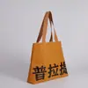 Sacolas de papel DuPont em estoque, sacolas de compras ecológicas de grande capacidade, sacolas de presente de alta qualidade personalizadas para Pilates resistentes a rasgos e ioga