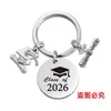 Colgante Llavero Acero Inoxidable Redondo Transfronterizo Europeo y Americano Temporada de Graduación 2026 Regalo Gorro de Doctorado Llavero de Metal Grabado
