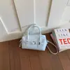 Bolsa de Mão com Design de Nicho Estilo Coreano 2026 Verão Nova Tendência Texturizada Fashionável Bolsa Boston Estilosa Bolsa de Ombro