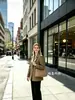 Ropa de mujer de comercio exterior transfronterizo más vendida en Amazon 2026 otoño blazer de raya diplomática color caqui de un solo botón para mujer