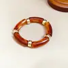 Pulsera Exagerada de Acrílico con Estampado de Leopardo y Perlas Europeas y Americanas Pulsera de Lujo Ligero de Gama Alta Diseño de Nicho Joyería de Moda Venta al por Mayor