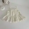 Conjunto de top de manga larga con sobrecapa de encaje de doble capa para bebé estilo INS y falda con tirantes para niña