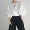 Corea del Sur verano nuevo elegante cuello redondo un botón diseño hueco suelto manga de farol protección solar camisa top