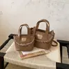 Bolsa de mão de renda com bolinhas fofa estilo coreano transfronteiriça, nova mini bolsa transversal de outono de 2026, bolsa saco