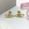 Brincos Saturno Transfronteiriços Mais Vendidos da Rainha Mãe para Mulheres, Pino de Prata 925, Luxo Leve, Simples Brincos Planeta Vivienne, Atacado de Fábrica