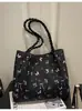 Bolso tipo cubo estampado dulce modelo nuevo 2026, gran capacidad, bolso de hombro moderno y versátil, bolso de alta gama para el día a día, bolso tote para mujer