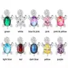 Estilo Caliente Europeo y Americano Juego de Tres Piezas de Piedras de Colores Accesorios de Joyería de Simulación Piedra Colorida Collar de Tortuga Pequeña Anillo Pendientes Mujeres Venta al por Mayor